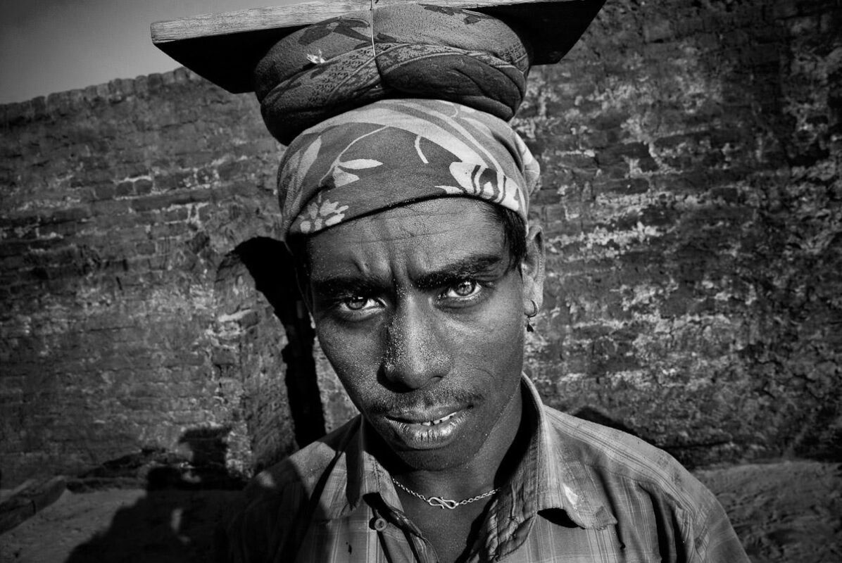 The brickfield labourers work in poor conditions in the stifling heat and have no protective gear. As migrant workers, they receive no healthcare from their employers and they earn less than $2 a day.